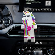 Image of Pukeycorn the unicorn Hug Buddy attached to a car air vent