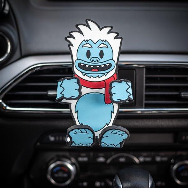 Image of the Yeti Hug Buddy attached to a vehicle air vent with arms and legs in the closed position ready to hold a cell-phone or GPS smart device