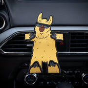 Image of Relaxa the Llama Hug Buddy attached to a car air vent with arms and legs in the folded closed position ready to hold a cell phone or other smart device