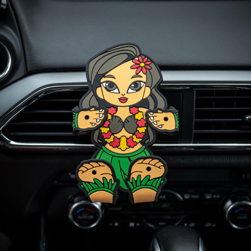Image of Hula Girl Hug Buddy attached to a car air vent waiting to grasp your cell-phone or smart device