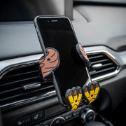 Image of Stripes the Eagle Hug Buddy holding a cell phone while attached to a vehicle air vent